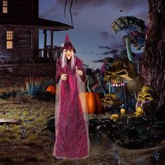 Hanging witch on a haunted porch with pumpkins and gravestones