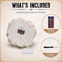 printed card showing what is in the box: the statue lying on its back with the battery compartment in the base open, plus the spare batteries and the small screwdriver