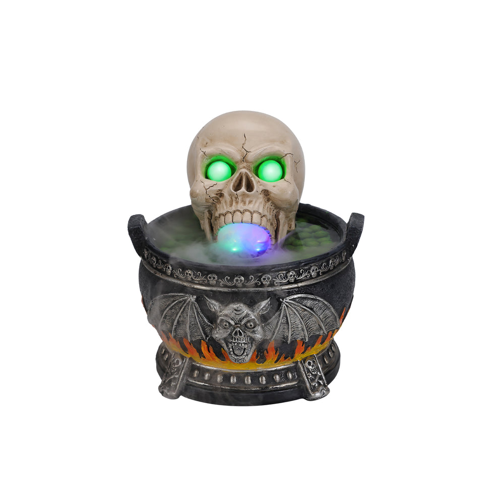 Skull cauldron resin statue on a plain background, side view, with the fog opening at the mouth facing forward