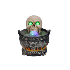 Skull cauldron resin statue on a plain background, side view, with the fog opening at the mouth facing forward