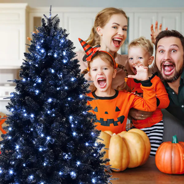 Tall black pre lit tree with white LED lights against a bright window