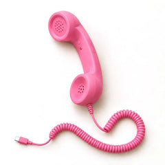 Retro smartphone handset, pink, with the USB-C plug
