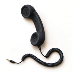 Retro smartphone handset, black, with the 3.5 mm headphone jack plug