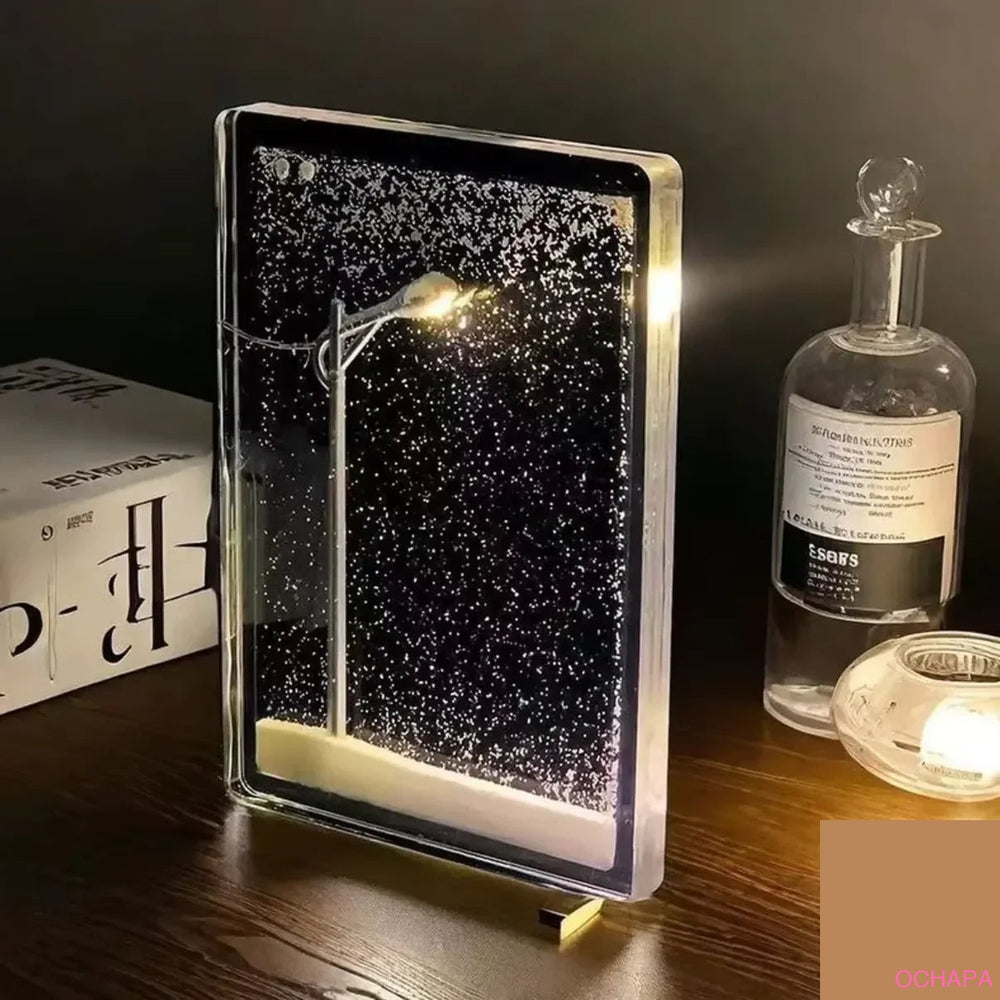 Snow globe night light on bedside table - cozy winter bedroom decor