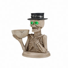 Skeleton Halloween statue on a plain background, three quarter view, showing the rib and bone texture and the bat carved hat