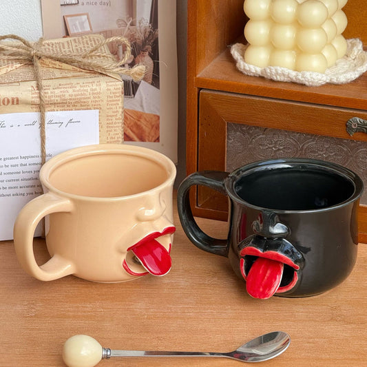 Weirdly shaped cup with a tongue sticking out - ceramic mug. A funny and amusing gift for pranks.
