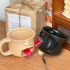 Weirdly shaped cup with a tongue sticking out - ceramic mug. A funny and amusing gift for pranks.