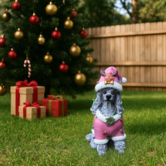 The Poodle in the pink Santa coat out on the lawn at dusk with the lights of the house behind