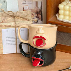 Weirdly shaped cup with a tongue sticking out - ceramic mug. A funny and amusing gift for pranks.