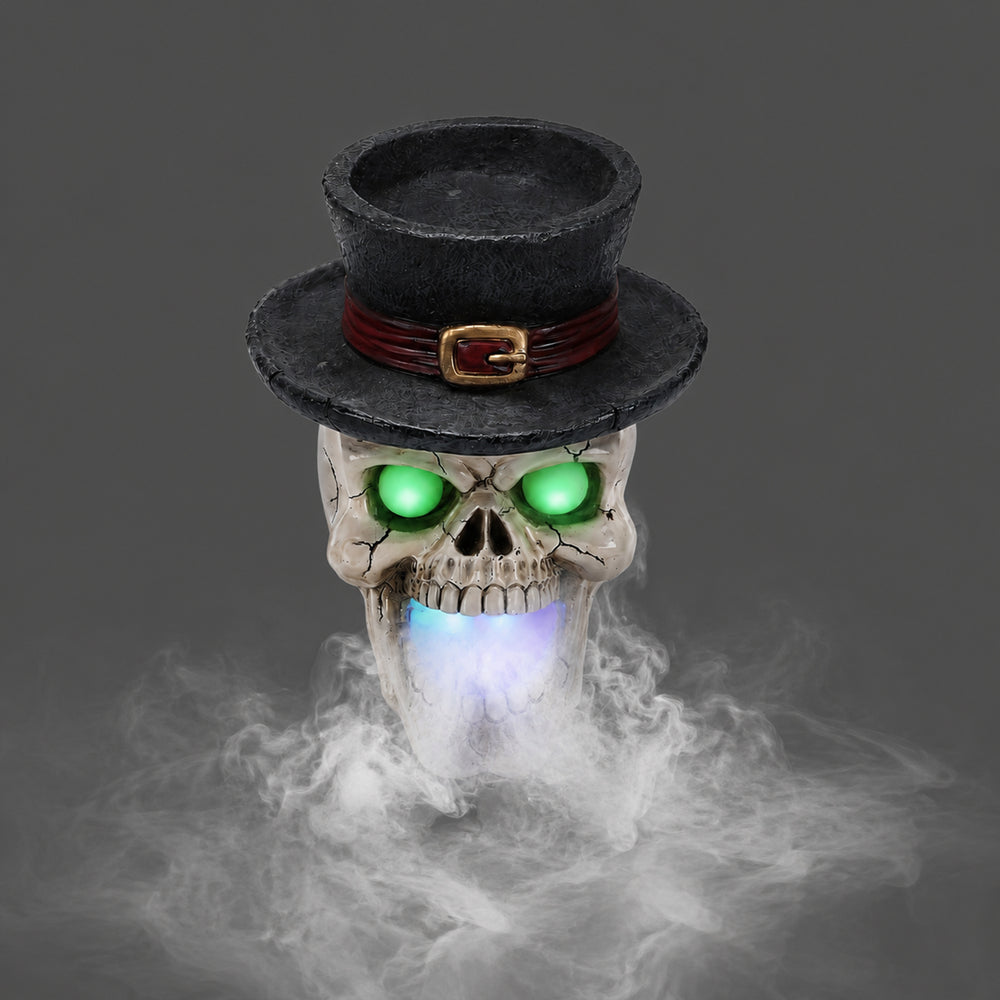 Top hat skull light up statue on a plain gray background, three quarter view, with fog coming from the mouth