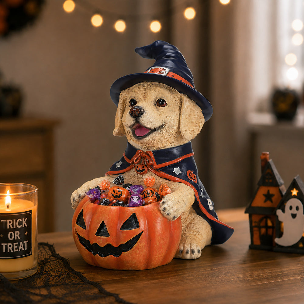 The same labrador witch puppy on a mantel with a boo banner and small pumpkins around it