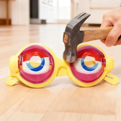 Pink funny glasses with moving eyes prank expression