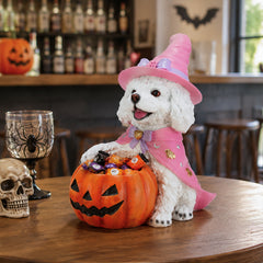 The same white witch puppy beside a carved pumpkin and a glass on a bar cart