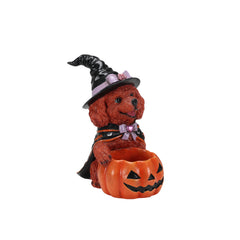Brown poodle witch statue on a plain background, side view, showing the cape down its back and the bowl in front