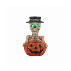 Skeleton pumpkin bowl Halloween statue on a plain background, front view, with glowing green eyes