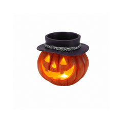 Witch hat pumpkin storage bowl on a plain background, three quarter view, showing the ribbed resin skin
