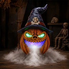 Witch hat pumpkin fogger on a rustic table with a carved lit face, glowing green eyes and mist at the base