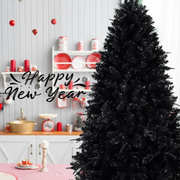 Family in Halloween costumes behind a lit black Christmas tree
