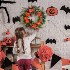 Four scenes showing the fall wreath on a mantel, a blue door, a wall and a window