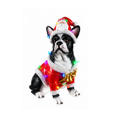 The French bulldog in the red Santa coat on a white background with the bulb string lit up around the body