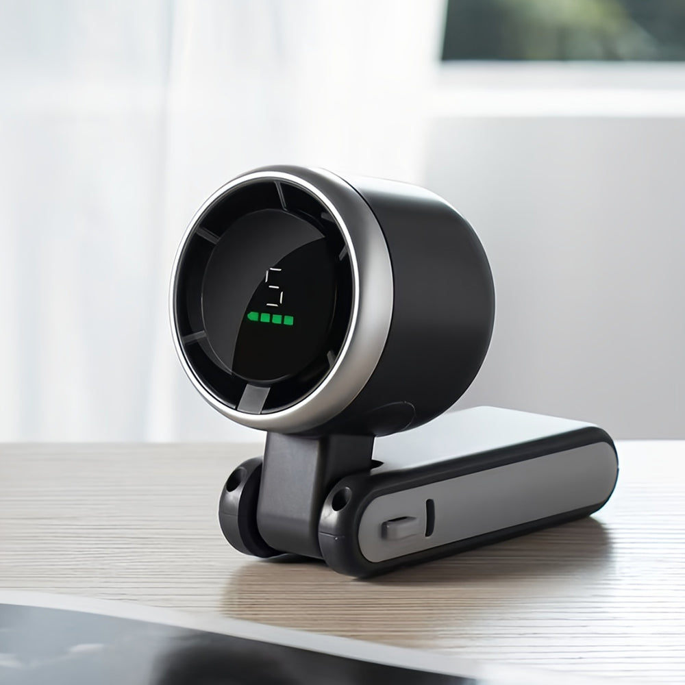 Portable mini USB fan for handheld use, foldable and compact design