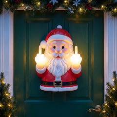 Santa Glow light-up cheeky Santa door decor - glowing fists hung on front door at night