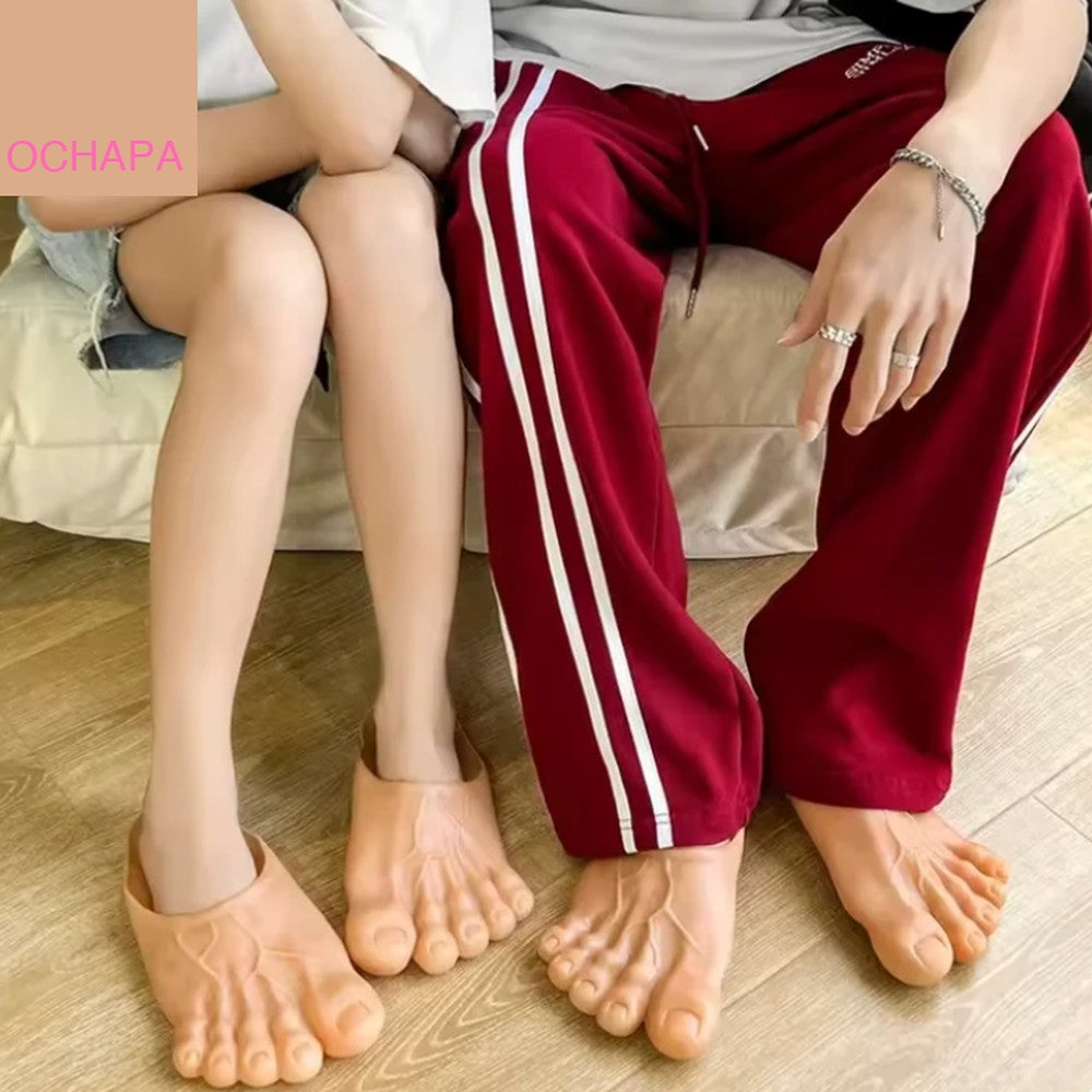 Funny foot slides lifestyle shot - oversized realistic slippers getting laughs at home