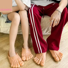 Funny foot slides lifestyle shot - oversized realistic slippers getting laughs at home